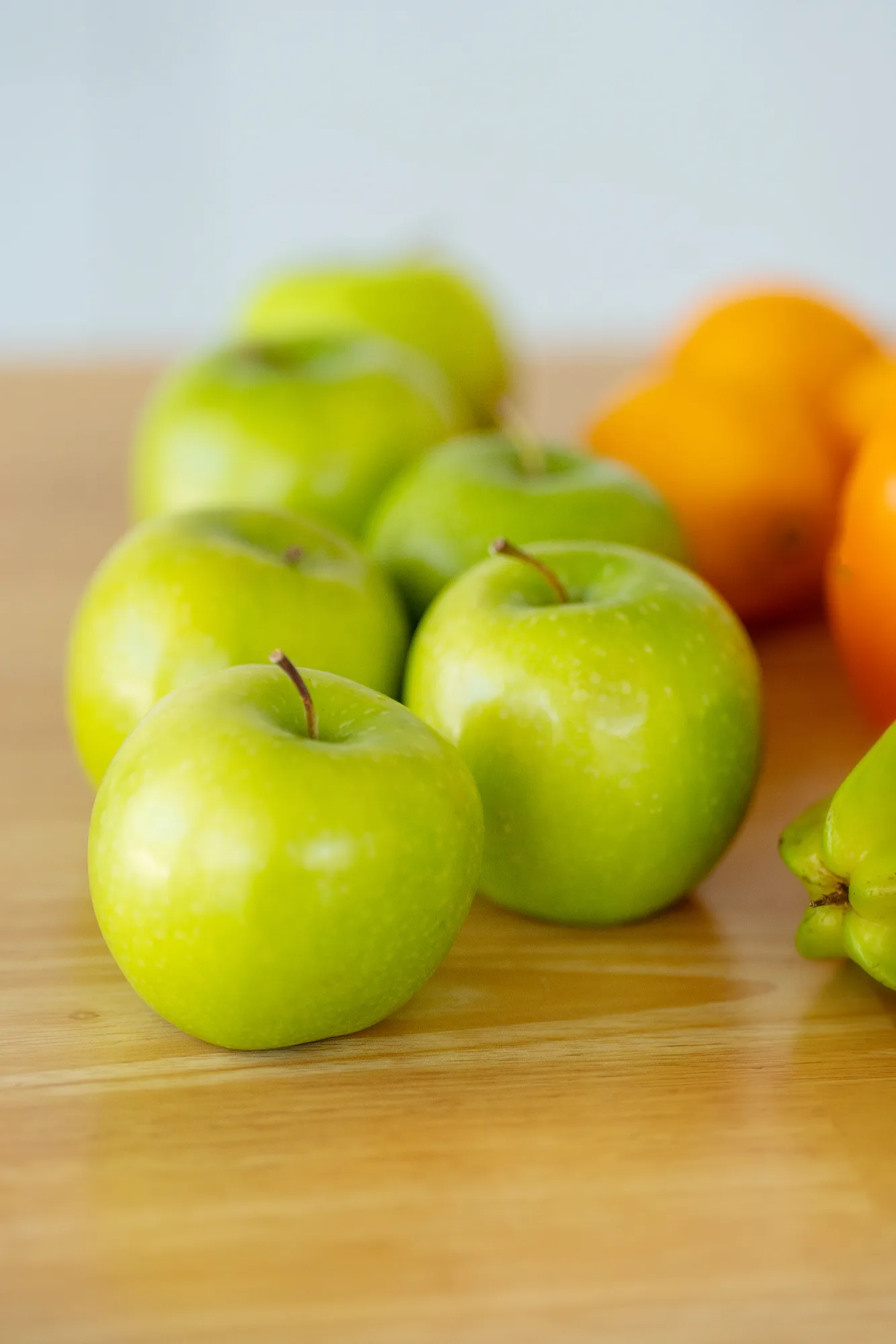 Cici's signature green apples arranged on a countertop
